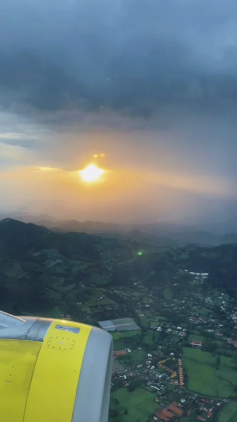Dramatic sky yellow sunset on a cloudy sky in Colombia, aerial view Stock Footage 268879496