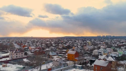 Dramatic skyes and light over winter suburbia after snow storm. Stock Footage 124549535