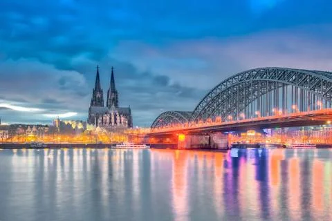 Dramatic skyline by Rhine River in Cologne, Germany Photos