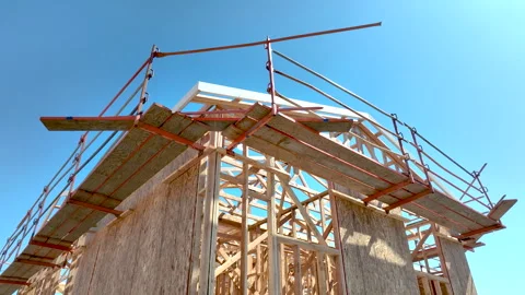Dramatic Slow Motion  Crane Movement of New Home Wood Framing Construction Site Stock Footage 306092007