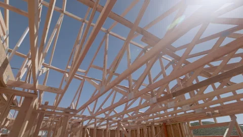 Dramatic Slow Motion Panning Movement of New Home Wood Framing Construction Site Stock Footage 306088458