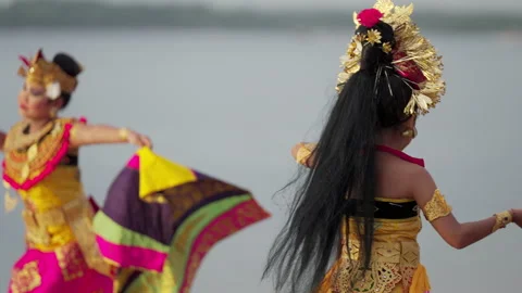 Dramatic slow motion shot, two balinese dancers dancing in bali, southeast asia Stock Footage 265728942