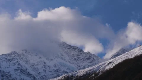 Dramatic Snowstorm Clouds In Misty Caucasus Mountains Stock Footage 320853246