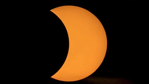 Dramatic solar eclipse with sunspots visible Stock Footage 342572010