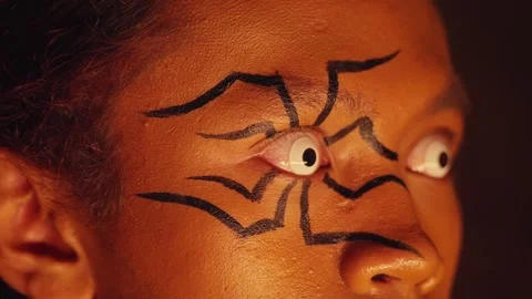 Dramatic Spider Web Face Paint Close-Up Stock Footage 296680817