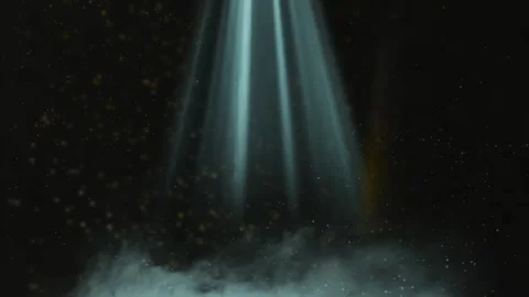 Dramatic spotlight beams cutting through dark smoke with glowing golden Stock Footage 343481509