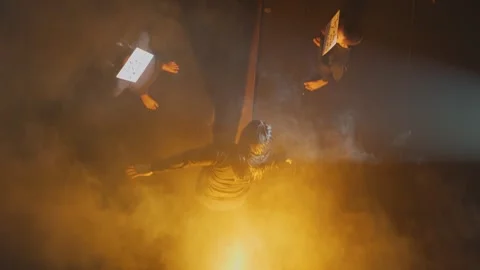 Dramatic Stage Performance with Fog and Light Stock Footage 296588115