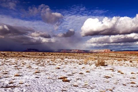 Dramatic Storm and Sunrays Over Grand Canyon West: A Duel of Light and Shadow Stock Photos