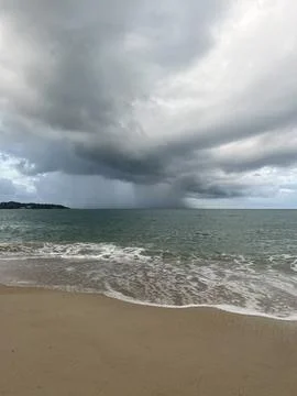 Dramatic storm cloud formation over the ocean at Lamai Beach, with visible .. Stock Photos