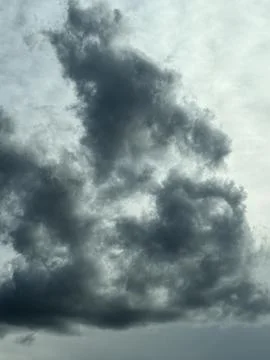 Dramatic Storm Clouds and Sunlight Close Up 写真素材