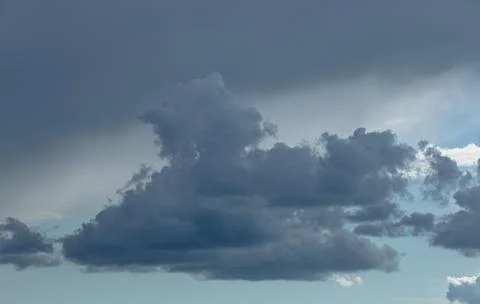 Dramatic storm clouds for the background. Stock Photos
