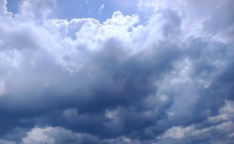 Dramatic Storm Clouds in Blue Sky Texture 库存照片