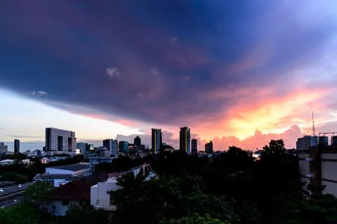 Dramatic storm clouds in city. Stock Photos