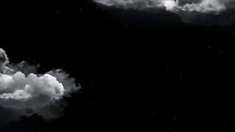 Dramatic storm clouds drifting across dark night sky with subtle falling rain Stock Footage 344416208