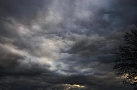Dramatic storm clouds fill the sky with a sense of foreboding Stock Photos