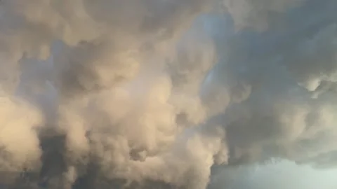Dramatic storm clouds filling the sky at sunset Stock Footage 337903796