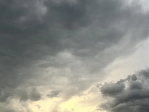 Dramatic Storm Clouds With Golden Light Near Horizon Stock Photos