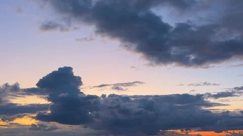 Dramatic storm clouds moving over sunset sky Stock Footage 330152754