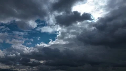 Dramatic Storm Clouds Opening to Blue Sky Timelapse Stock-Footage 334127879