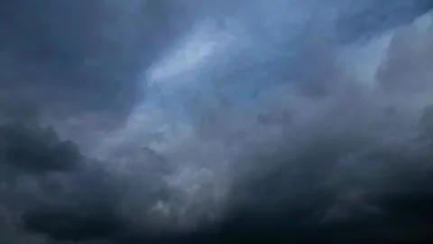 Dramatic Storm Clouds Opening to Blue Sky Timelapse Stock-Footage 334127880