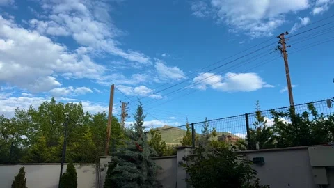 Dramatic Storm Clouds Opening to Blue Sky Timelapse Stock-Footage 334899964