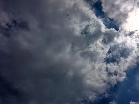 Dramatic storm clouds over blue sky Stock-Fotos
