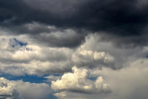 Dramatic storm clouds over a blue sky Foto stock