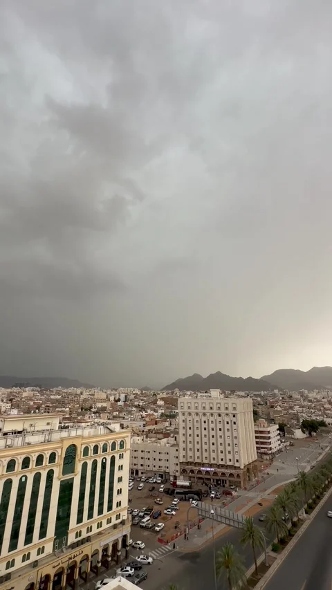 Dramatic Storm Clouds Over Madina Cityscape Stock Footage 334793900
