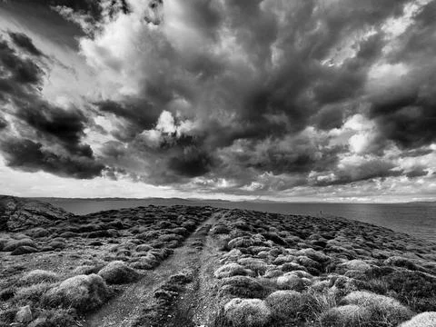 Dramatic Storm Clouds Over Mediterranean Coastline in Greece. Stylised Weather Stock Photos