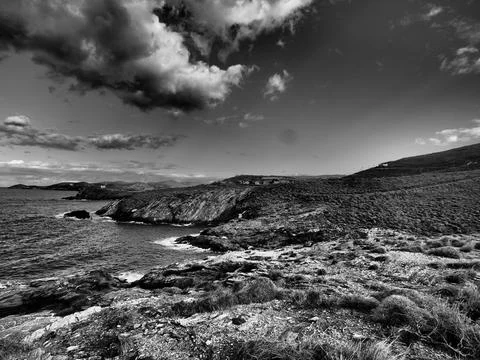 Dramatic Storm Clouds Over Mediterranean Coastline in Greece. Stylised Weather Stock-Fotos