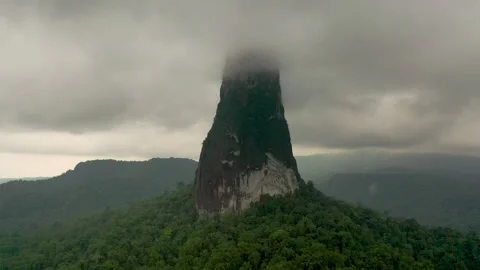 Dramatic storm clouds over mountain peak in São Tomé island Stock Footage 148425920