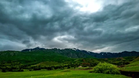 Dramatic Storm Clouds Over Mountain Range Landscape Video stock 308281869