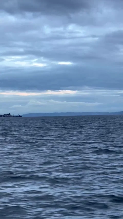 Dramatic Storm Clouds Over Open Water in Puget Sound, Washington Stock-Footage 336555379