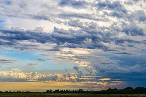 Dramatic Storm Clouds Over Prairie Landscape Stock Photos