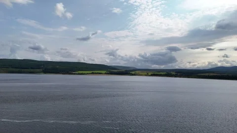 Dramatic Storm Clouds over Scottish Highlands Lake and Mountains - Aerial 4K Stock Footage 330781794