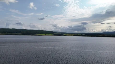 Dramatic Storm Clouds over Scottish Highlands Lake and Mountains - Aerial 4K Stock Footage 330782424