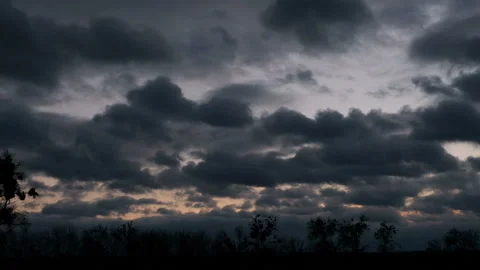 Dramatic storm clouds rolling over the forest Stock Footage 197605561