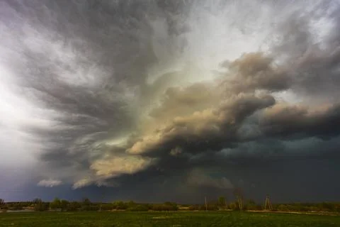 Dramatic storm clouds in the sky, dark severe storm clouds, supercell. Stock Photos