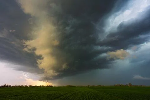 Dramatic storm clouds in the sky, dark severe storm clouds, supercell. Stock Photos