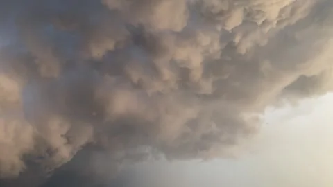 Dramatic storm clouds in the sky at sunset Stock Footage 337903830