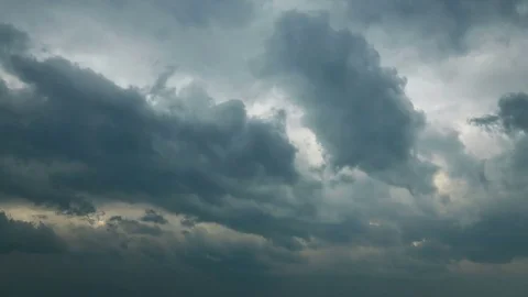 Dramatic storm clouds with sun beams at sunset time-lapse 스톡 동영상 78067266