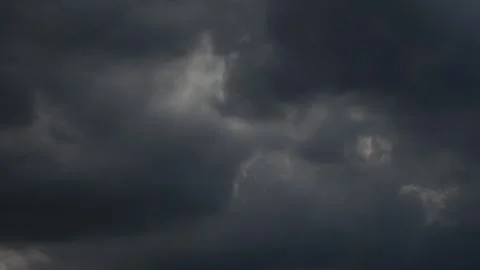 Dramatic Storm Clouds with Sunlight Breaking Through Stock Footage 340305149