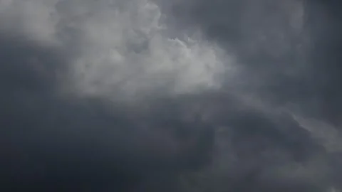 Dramatic Storm Clouds with Sunlight Breaking Through Stock Footage 340305164