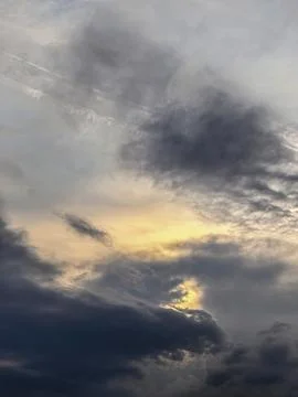 Dramatic Storm Clouds With Sunset Light In Sky Foto stock