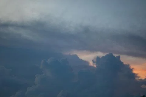 Dramatic Storm Clouds at Sunset Stock Photos
