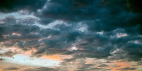Dramatic storm clouds at sunset Foto stock