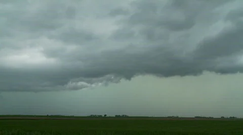 Dramatic storm clouds sweep across dark sky. Stock Footage 504132