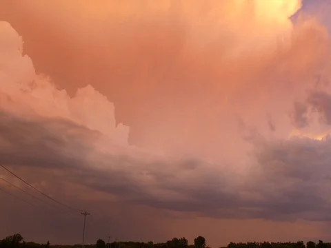 Dramatic storm front developing as the dawn breaks Stock Footage 76394480