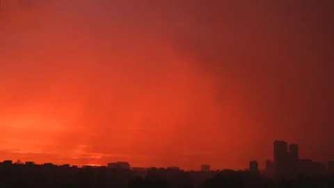 Dramatic storm timelapse. Epic cloudy rainy sunset over city buildings. Clouds Stock Footage 251730798