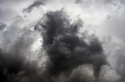 Dramatic stormy clouds after thunderstorm. Danger, Faith Concept. Stock Photos